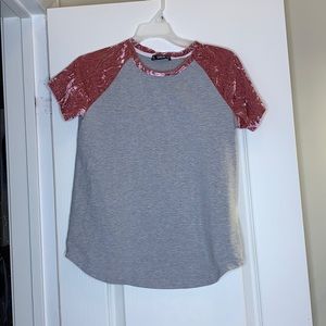 Grey top with pink velvet sleeves